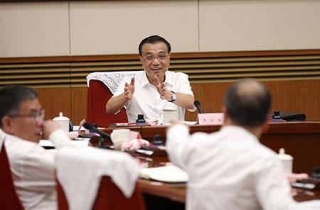 Amelyorasyon Faktori ak Restriktirasyon Ekonomik ak Chinwa Premye Minis Li Keqiang.jpg Manufacturing Upgrades and Economic Restructuring with Chinese Premier Li Keqiang.jpg